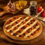 Imagem relacionada a Domino’s vai usar inteligência artificial em suas pizzas