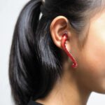 Imagem relacionada a Protetores auriculares inspirados em polvo para um acessório fofo e funcional