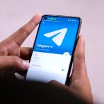 hands holding smartphone